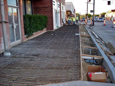 Heated sidewalks being installed