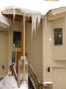 Roof in need of a roof deicing system