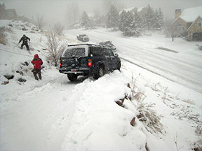 Treacherous snowy driveway in need of radiant heat