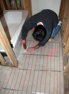 Floor heating cable being installed