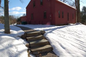 Heated walkway of crushed gravel and steps