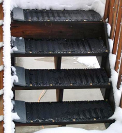 Heated traction mats for outdoor steps