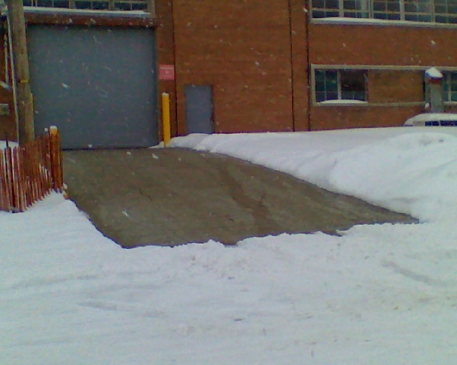 Radiant snow melting system installed in a loading ramp