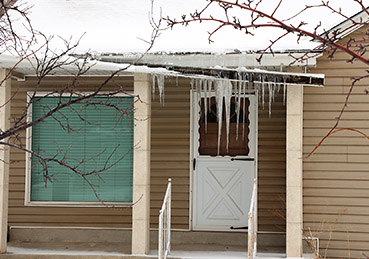 Gutter damage from snow and heavy ice buildup