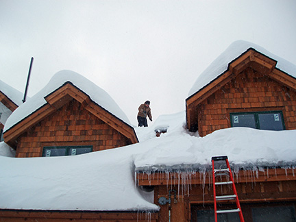 Clearing snow off of roof