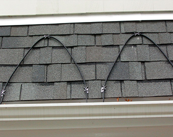 Roof de-icing cable installed along roof eave