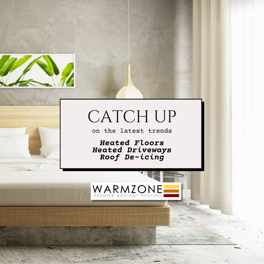Minimalist modern bedroom with a wood-frame bed, white bedding, large pendant light, and a botanical print on the wall. Overlay text reads: “Catch up on the latest trends – Heated Floors, Heated Driveways, Roof De-icing.” Warmzone logo is shown at the bottom.