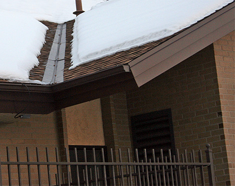 Roof de-icing cable installed along roof eave