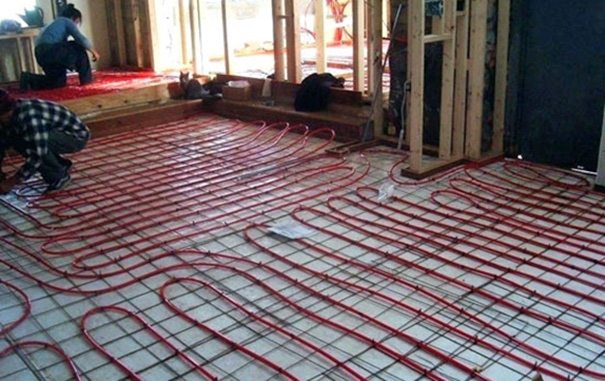 Tubing for a hydronic floor heating system installed.