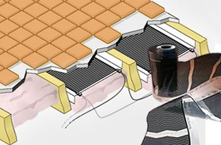 RetroHeat floor heating element installed between floor joists