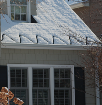 Roof de-icing and gutter heat trace systems