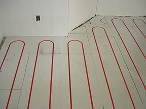 Hydronic floor heating system being installed