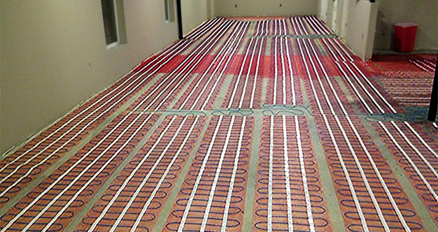 Electric floor heating cable in mats.