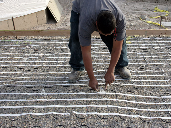 Concrete heated driveway being installed