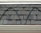 Install roof de-icing heat trace cable