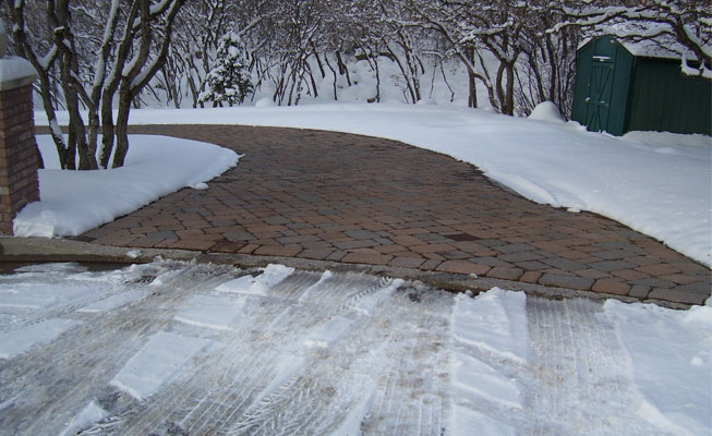 Heated driveway with brick pavers