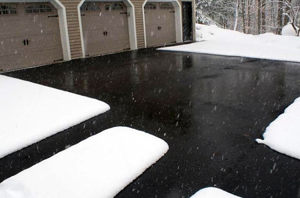 Heated asphalt driveway and pathways