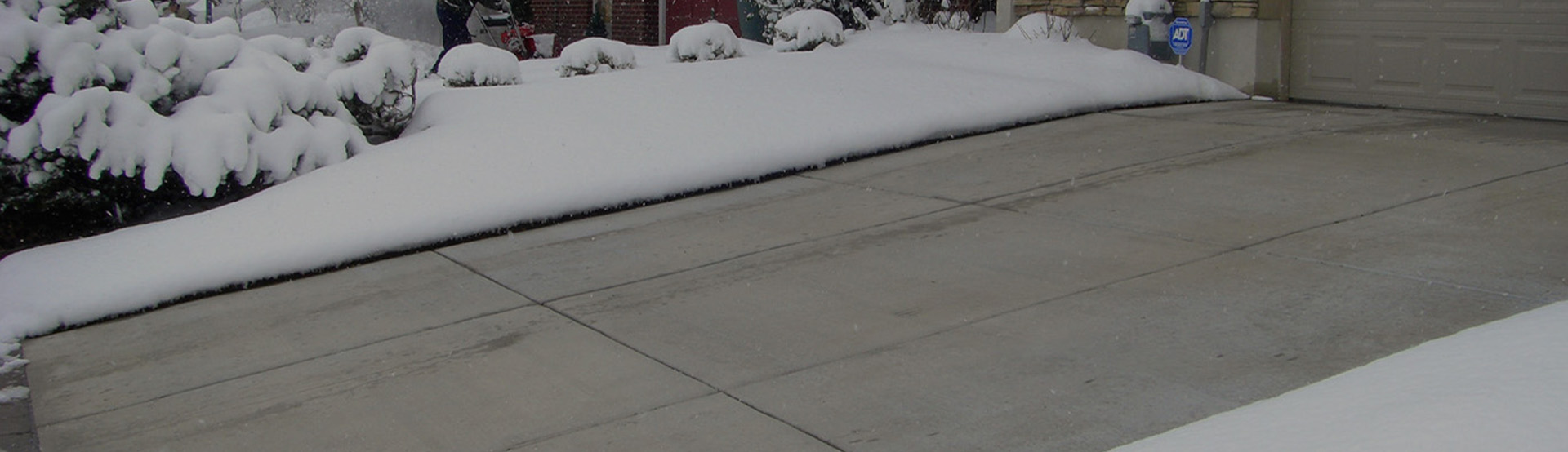 The benefits of heated driveways and snow melting systems banner