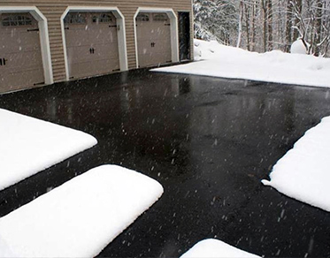 Heated asphalt driveway installation