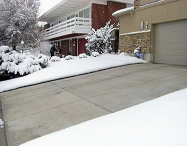 Concrete heated driveway after a snowstorm