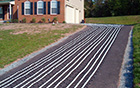 Heating mats laid out for asphalt heated driveway