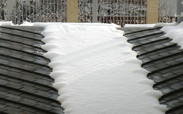 Heated paver tire tracks
