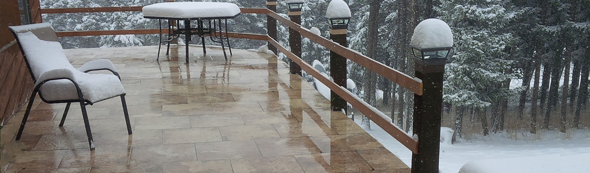 Heated balcony patio during a snowstorm