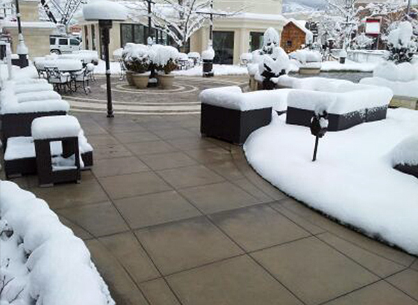 Heated patio areas and walk ways during a snowstorm