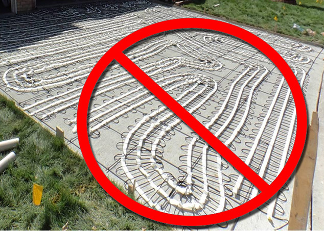 A heating mat improperly laid out for a heated driveway installation