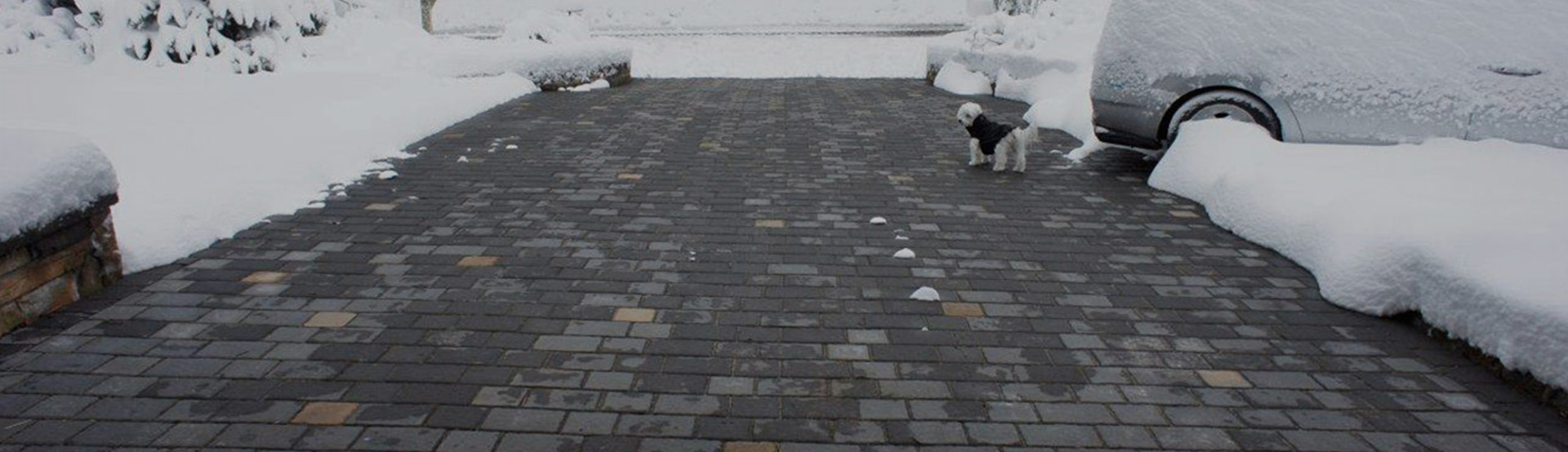 Radiant heated paver driveway banner