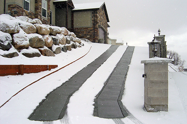 Heated driveway on an incline