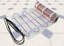 ComfortTile radiant floor heating cable on adhesive backed mat.